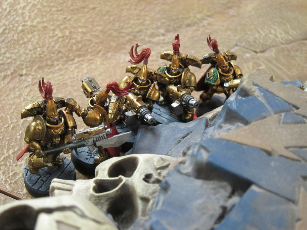 Custodes investigate a Chaos shrine.