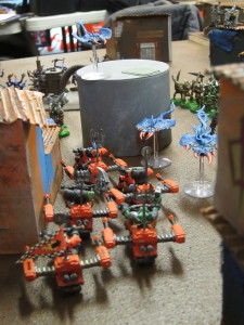 Orks ride into combat, going head-to-maw with the Daemons.