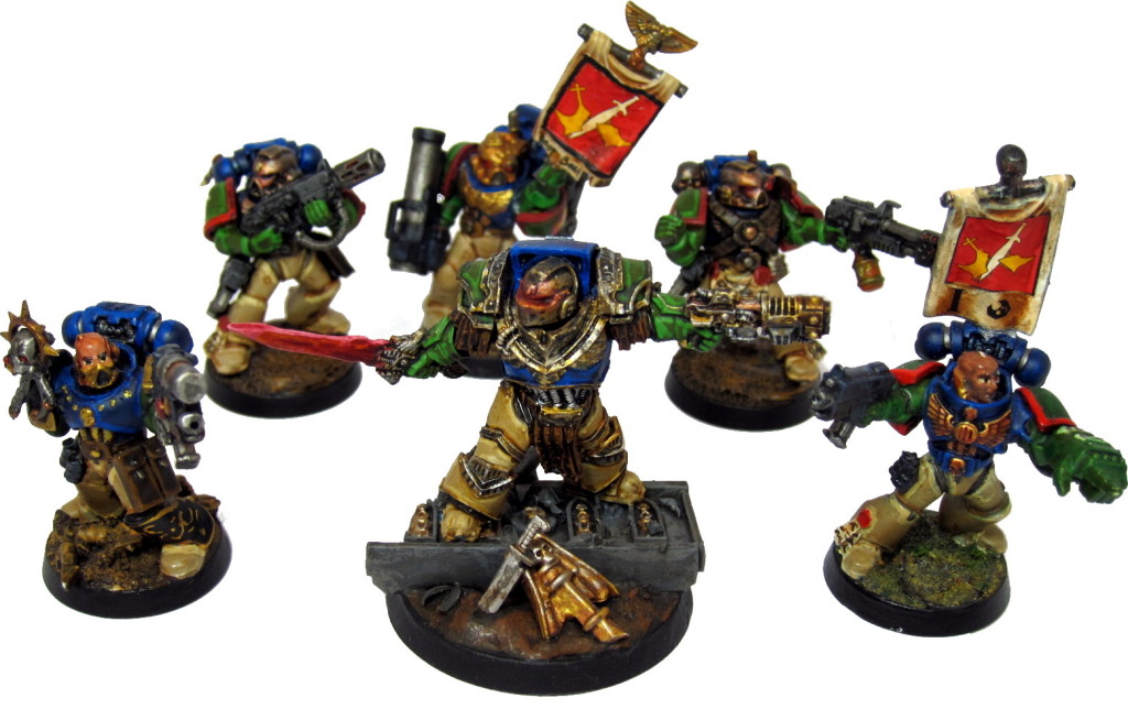 Captain Angholan with Sergeant Harbinger (left), First Sergeant Scolirus (right), and various Kingbreakers from Tactical 1.