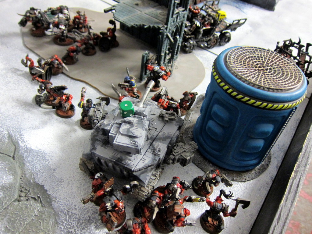 While the Armoured Company as well is mobbed by the Orks.