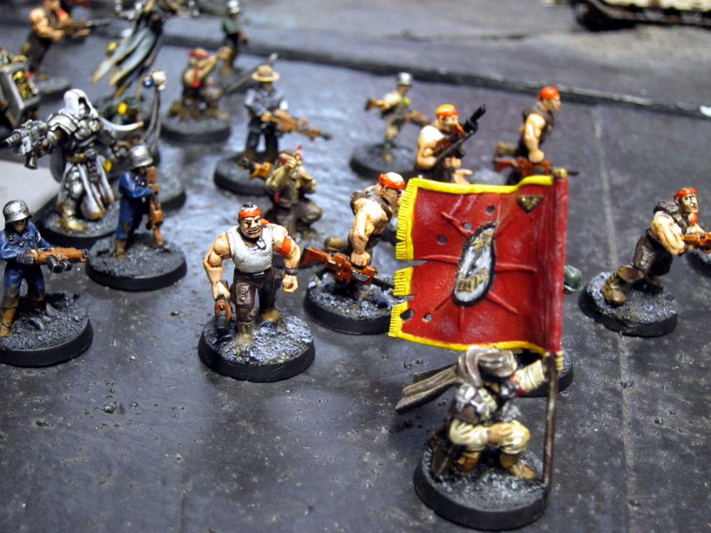 Imperial Guard roustabouts take up arms under the banner of psykers and priests.