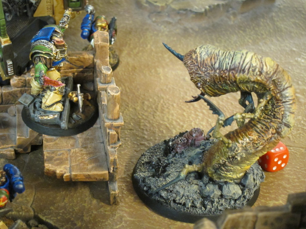 Captain Angholan faces off against the wormlord.