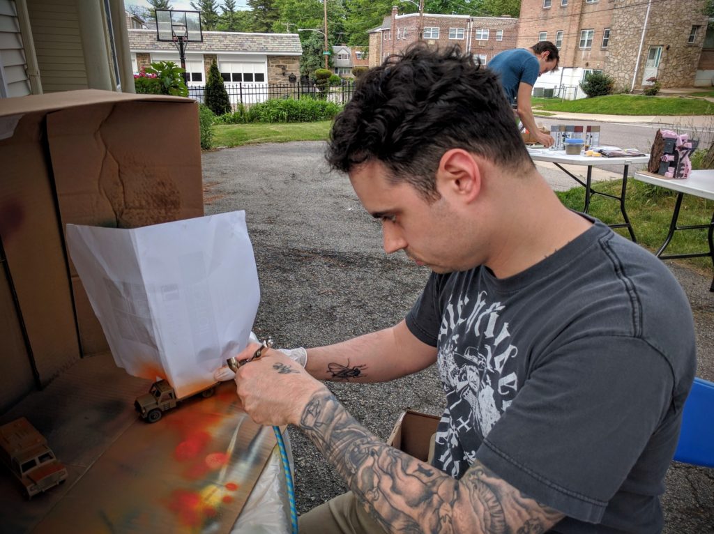 Jason working away like a servitor with an airbrush grafted onto his arm.