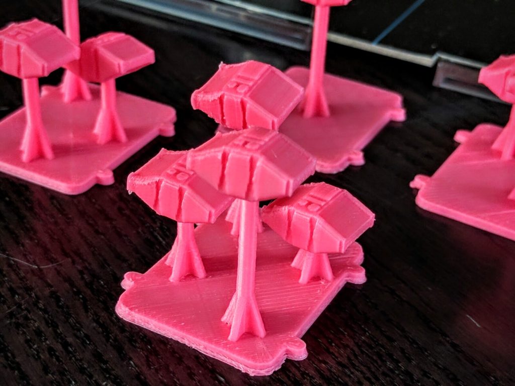 Extreme closeup. These parts have not been cut, trimmed, sanded, glued, or otherwise cleaned up in any way yet, this is straight off the printer just popping pods onto pegs.