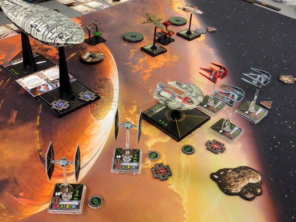 TIEs swoop in, destroying Rebel Cargo Pods unloaded from a GR-75.